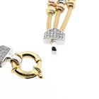 Afbeelding 5 van Tricolor gouden schakelarmband met zirconia