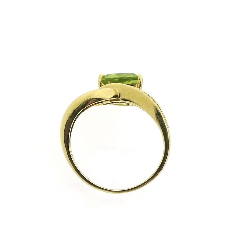 Image 3 of 18 carat gold V-shaped ring with peridot
