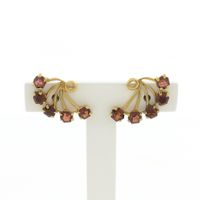 Gold stud earrings with garnet