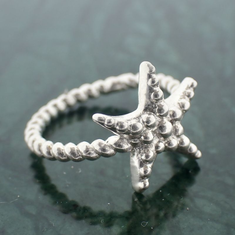 Image 4 of Silver ball ring with a starfish