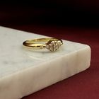 Image 10 of Gold entourage ring with diamonds; 0.18 ct.