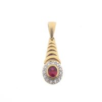 Gold pendant with synthetic ruby ​​and zirconia.