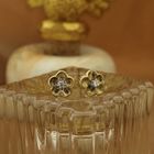 Image 2 of Gold stud earrings of a flower with diamond | 0.06 ct.