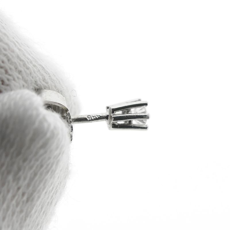 Image 6 of White gold solitaire stud earrings with 0.12 ct diamond.