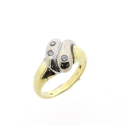 Image 1 of Two-tone gold solitaire ring with 0.105 ct diamond.