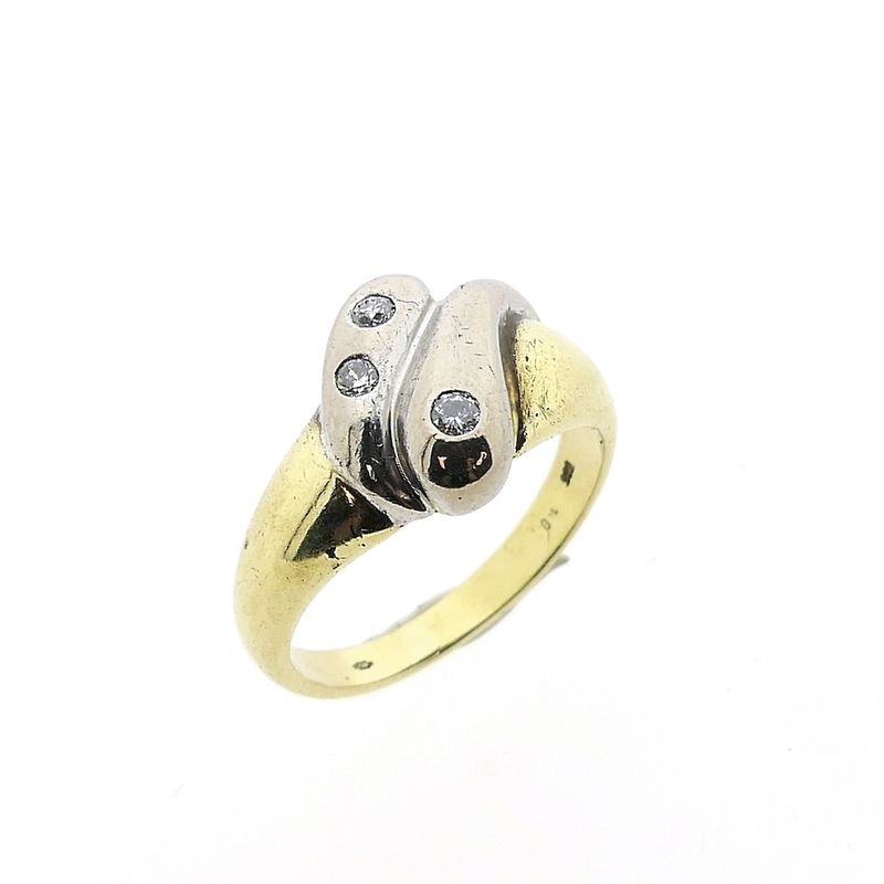 Image 1 of Two-tone gold solitaire ring with 0.105 ct diamond.