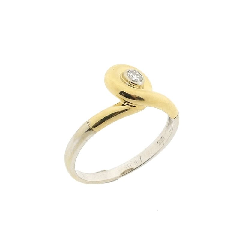 Image 1 of Two-tone gold solitaire ring with 0.05 ct diamond.