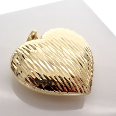 Image 2 of Silver pendant of a large gold-plated heart