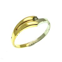 Two-tone gold solitaire ring with 0.03 ct diamond.