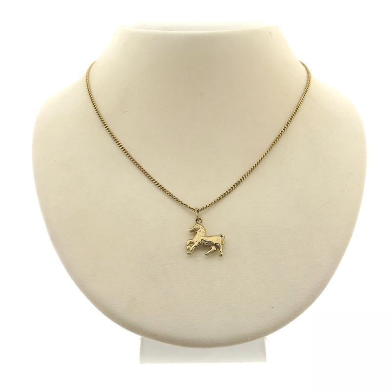 Image 4 of Gold pendant of a horse