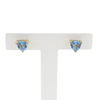 Gold stud earrings with blue topaz