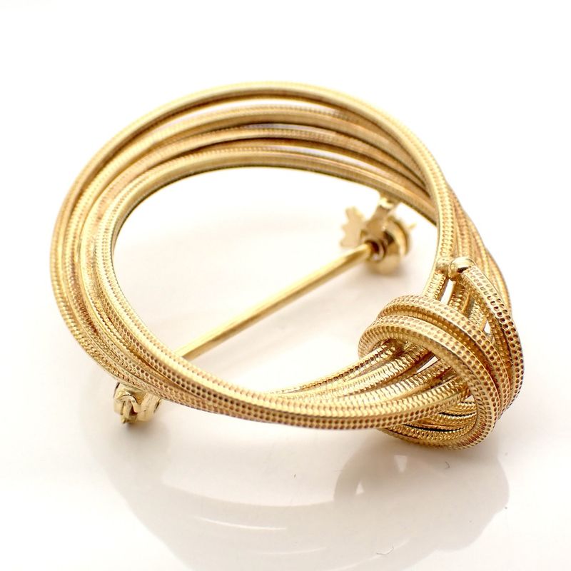 Image 1 of Gold brooch as a button