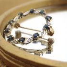 Image 8 of Gold brooch with sapphire and diamonds | 0.05 ct.