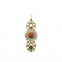 Antique gold pendant with blood coral