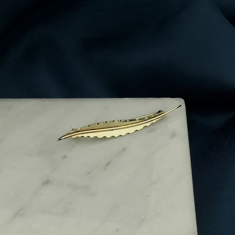 Image 2 of Vintage gold brooch of a feather