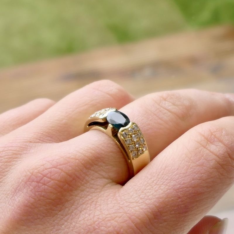 Image 9 of Gold ring with sapphire and diamond; 0.48 ct.