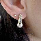 Image 5 of 18 carat gold stud earrings with cultured pearl and 0.18 ct diamond.