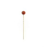 Gold lapel pin with blood coral