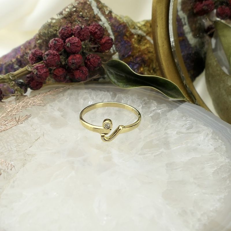 Image 2 of Gold solitaire ring with diamond; 0.005 ct.