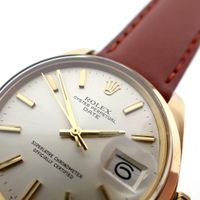 Rolex Date 1500; 18k gold watch