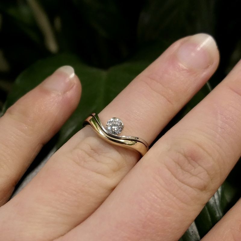Image 8 of Two-tone gold solitaire ring with diamond | 0.24 ct.