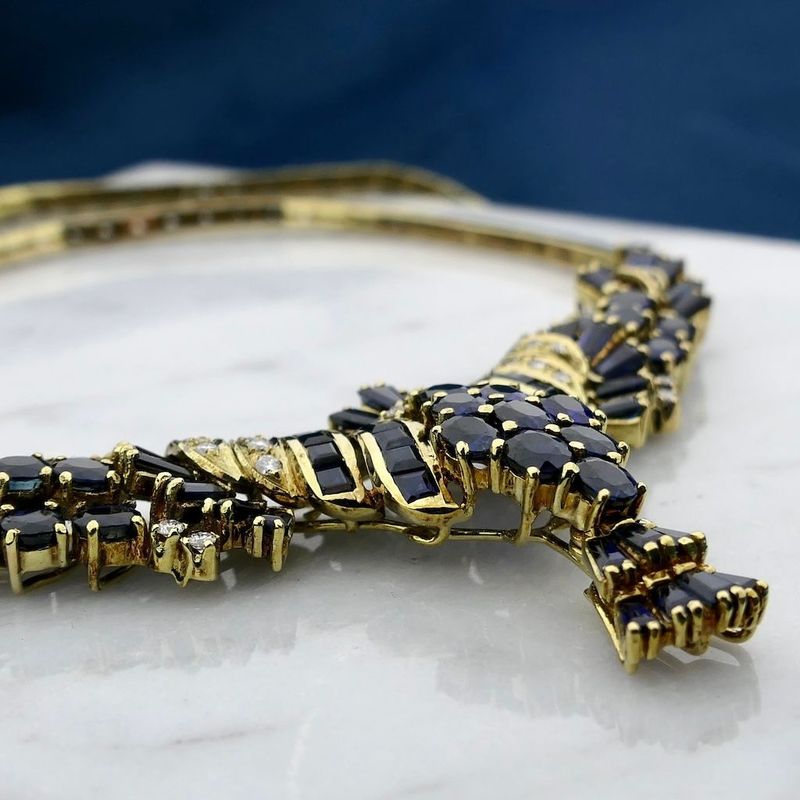 Image 2 of Golden omega link necklace with sapphires and diamonds; 0.34 ct.