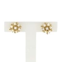 Gold floral stud earrings with pearl