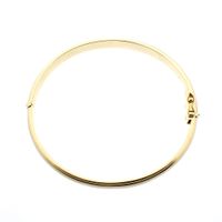 Solid gold slave bracelet.