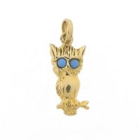 Gold owl pendant with turquoise