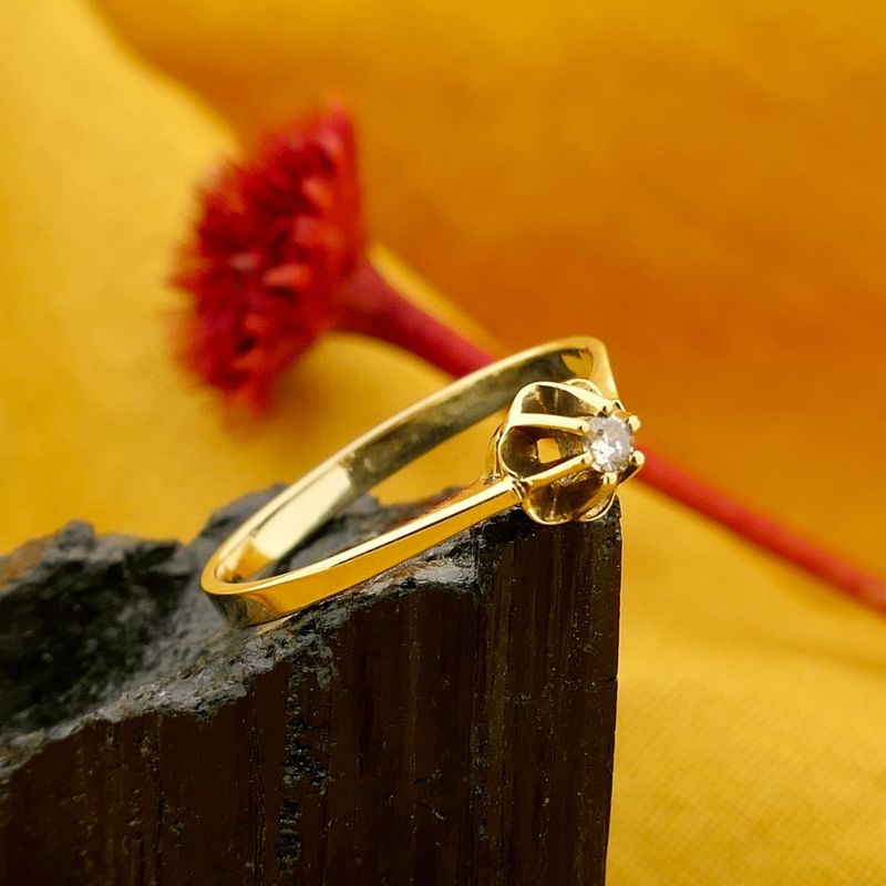 Image 2 of Gold solitaire ring with diamond; 0.05 ct.