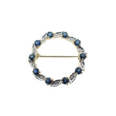 Image 1 of Gold brooch with sapphire and diamonds | 0.05 ct.