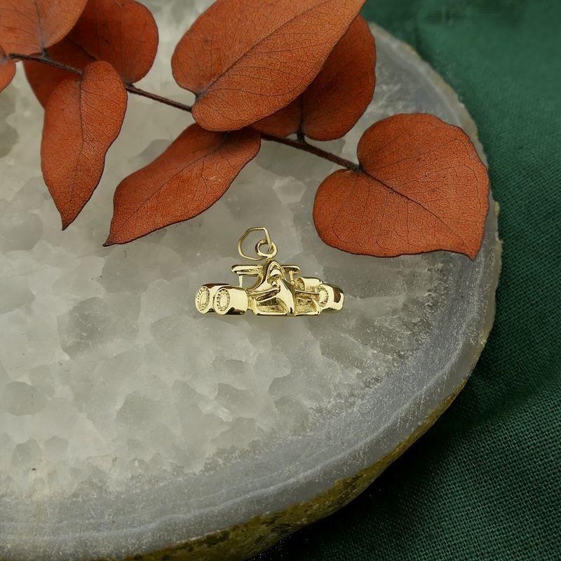 Image 2 of Gold pendant of a Formula 1 racing car