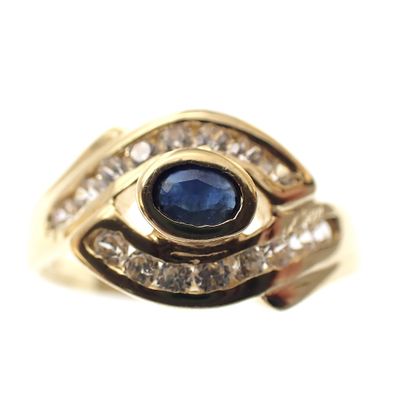 Image 2 of 18 carat gold ring with zirconia and sapphire eye