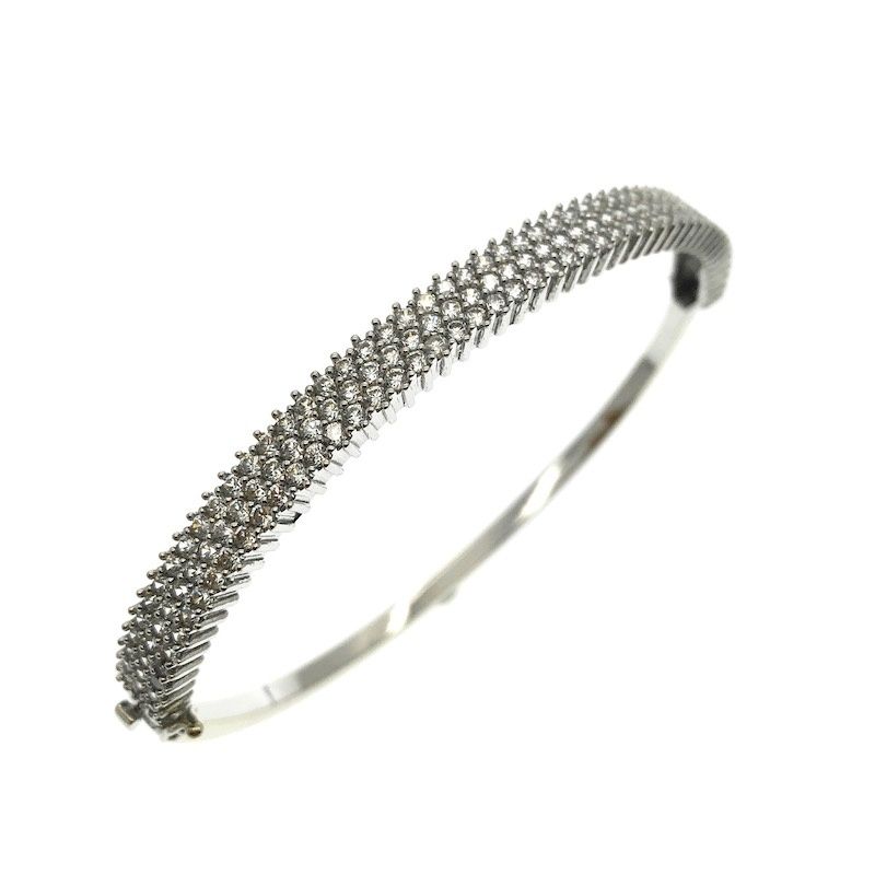 Image 1 of White gold bangle bracelet with a cluster of zirconia stones | Ø 63 mm