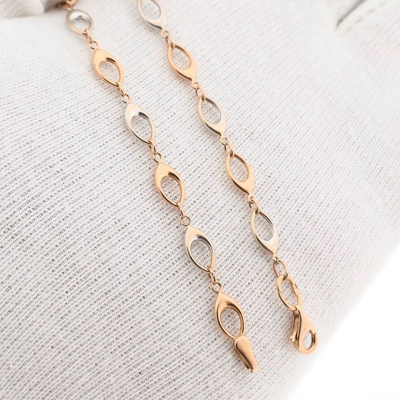 Afbeelding 9 van Bicolor gouden fantasie schakelarmband | 19 cm