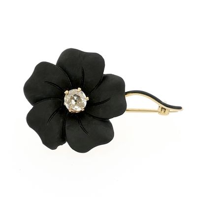 Image 1 of Gold flower brooch with onyx and diamond | 0.60 ct.