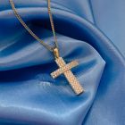 Image 2 of Gold pendant of a cross with zirconia