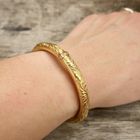Image 10 of 22 carat Surinamese gold bangle; size S/M