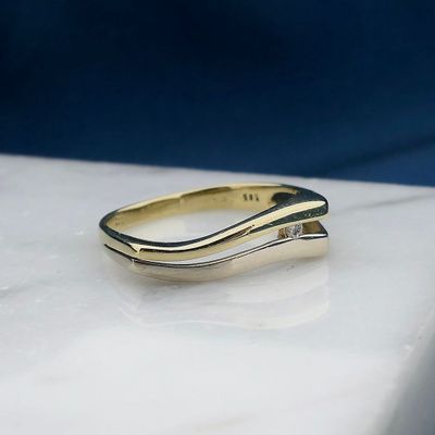Image 2 of Two-tone gold ring with diamond; 0.02 ct.