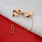 Image 2 of Rose gold bow brooch with safety cord