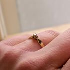 Image 7 of Gold solitaire ring with diamond; 0.04 ct.