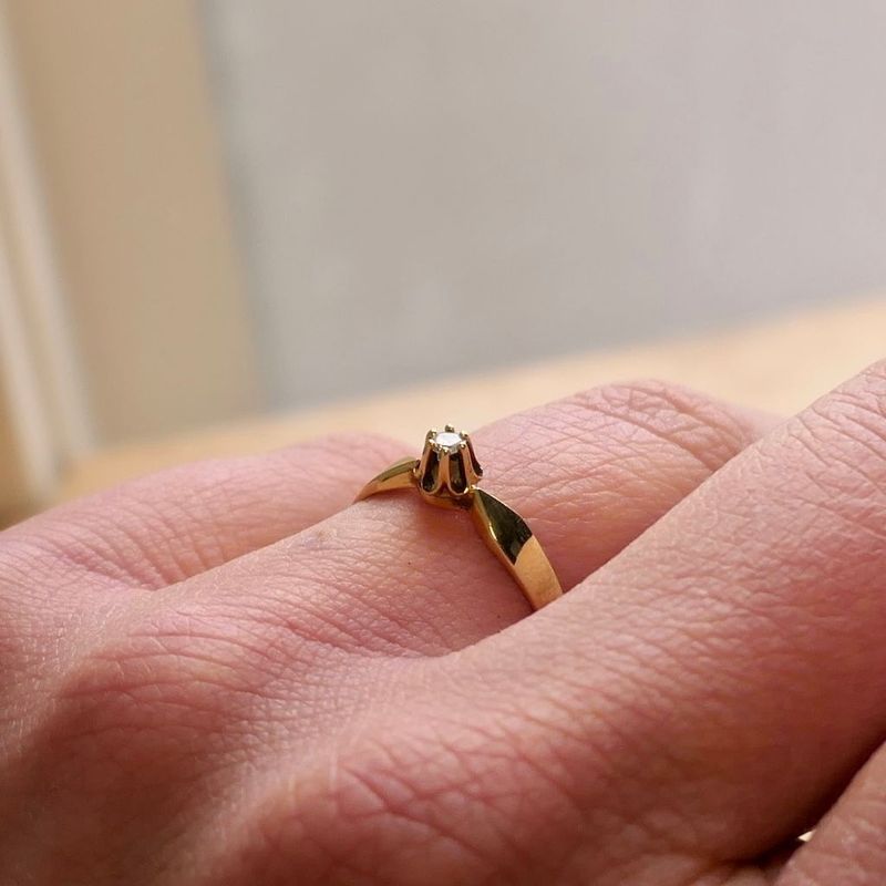 Image 7 of Gold solitaire ring with diamond; 0.04 ct.