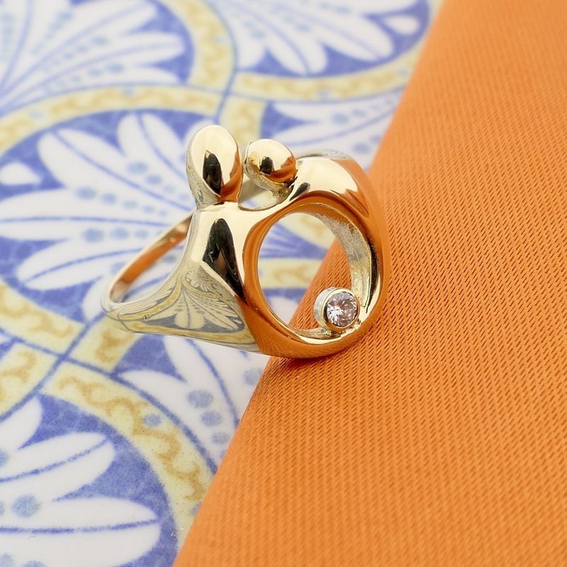 Image 6 of Gold mother-child ring with diamond; 0.06 ct.