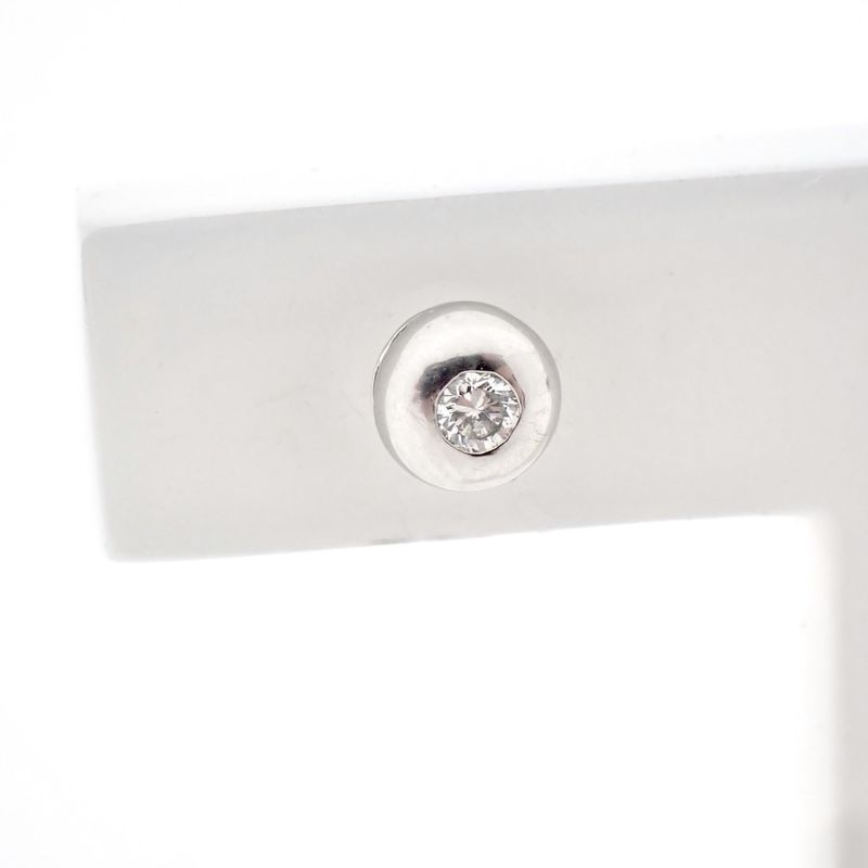 Image 3 of 18 carat white gold solitaire stud earrings with 0.07 ct. diamonds.