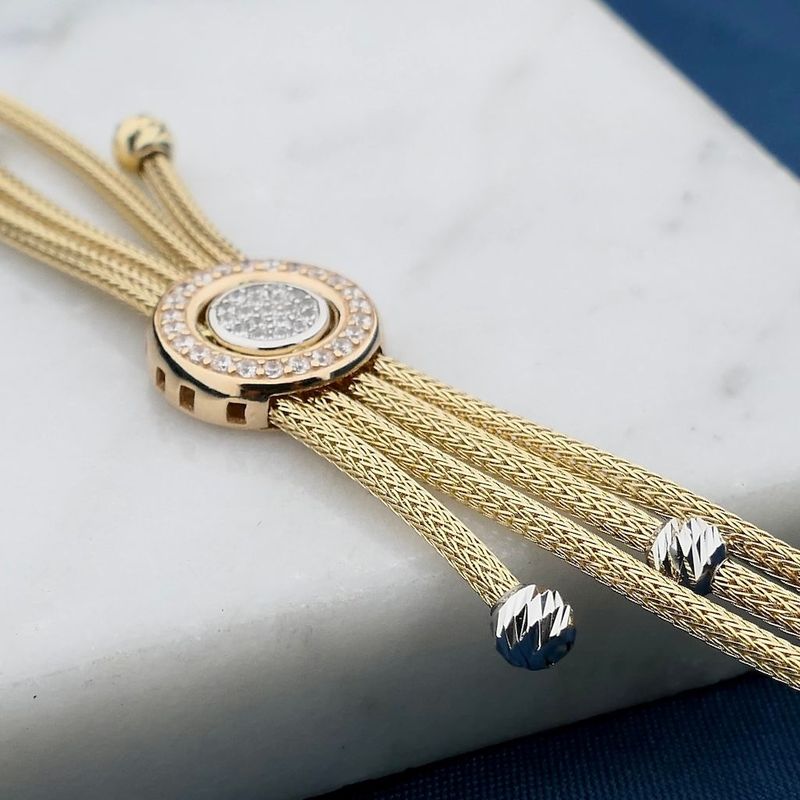 Afbeelding 2 van Tricolor gouden schakelarmband met zirconia