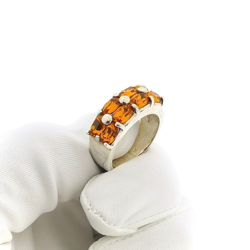 Image 10 of Biba silver ring with orange zirconia stones.