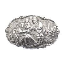 Silver brooch with scene
