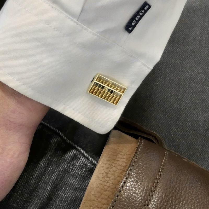 Image 12 of Gold cufflinks as an abacus.