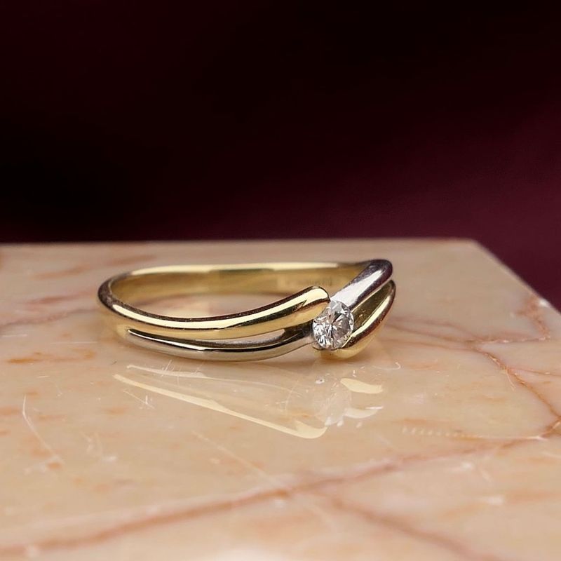 Image 2 of Two-tone gold Diamond ring with 0.08 ct diamond.