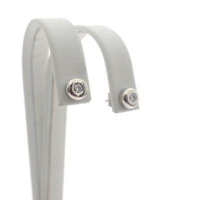 White gold solitaire stud earrings with diamond | 0.06 ct. Image 1 of White gold solitaire stud earrings with diamond | 0.06 ct.